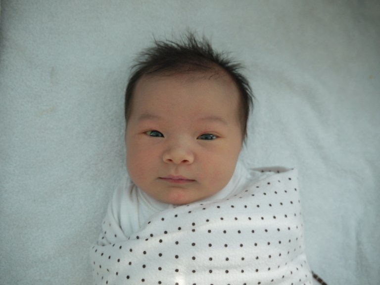 Isa's passport photo.