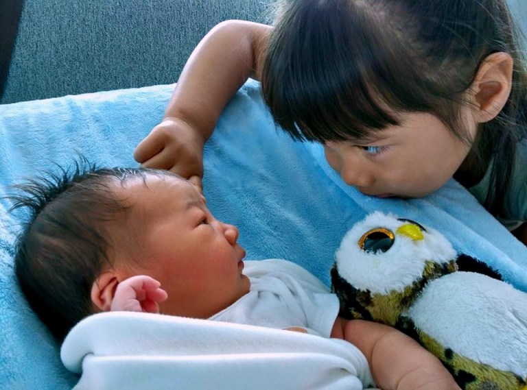 Isa is fascinated by her big sister, Eva. Here they share some important bonding after Eva brought one of her favorite owls to share with Isa.