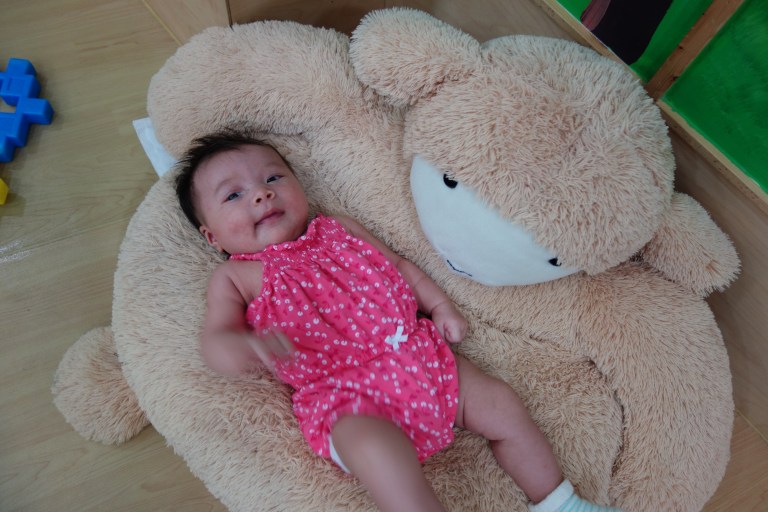 Resting on a little lamb.