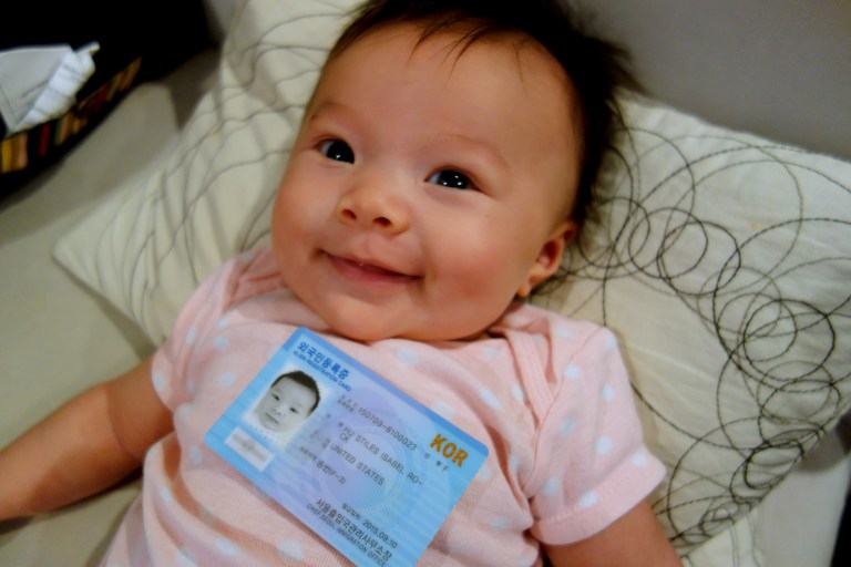 Isa and her alien registration card.