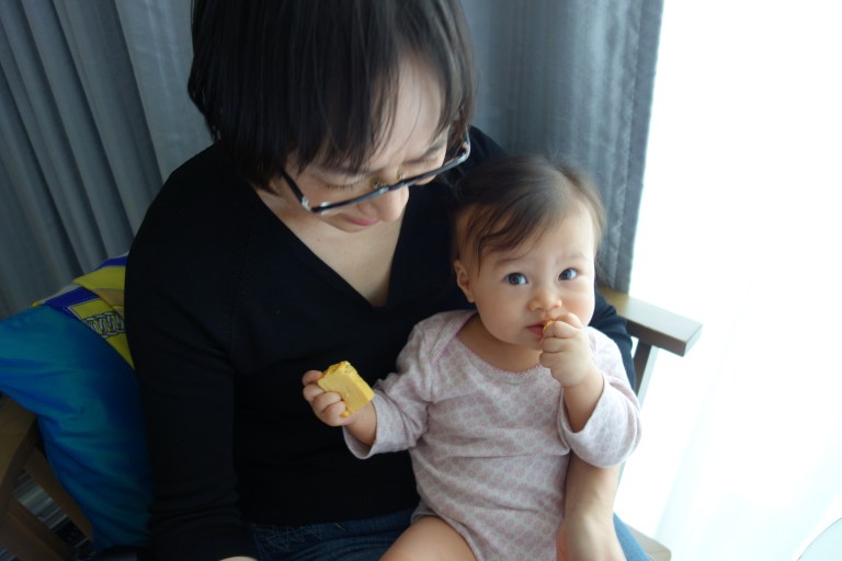 Oma feeds Isa her new favorite food, tamagoyaki. She eats about six pieces each day. 