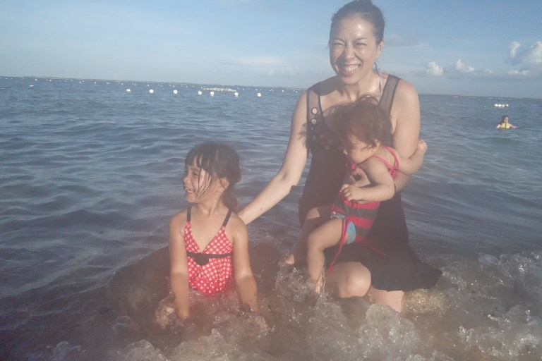 Isa was feeling skeptical about riding waves.