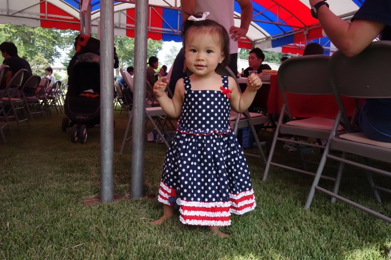Walking barefoot in the grass.